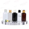200ML PET 24MM ROUND BOTTLE WITH MULTIPLE PRESS CAPS.