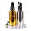 18MM ROUND SHOULDER GOLD GLASS BOTTLE AND BLACK OIL SERUM PUMP